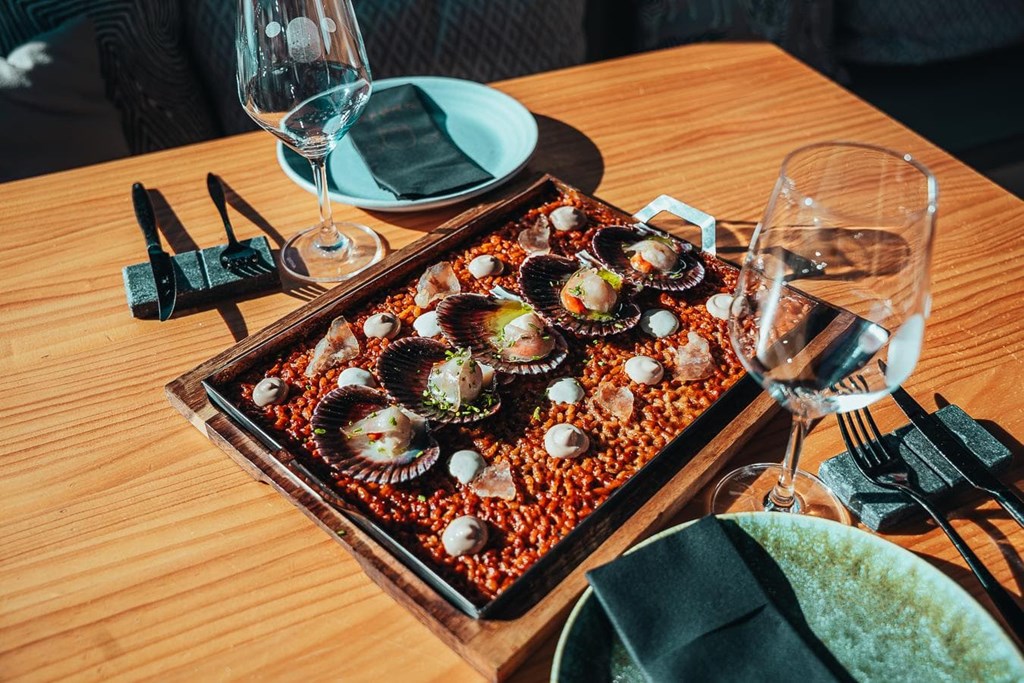 Rice cooked in a tin with scallops and Iberian pork jowl. - Image 1